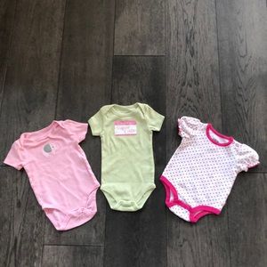 Bundle of three baby girl’s onesies